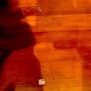 18 k white hold necklace with a diamonds Sanrio pendant
